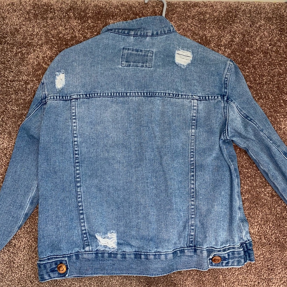 Distressed jean jacket